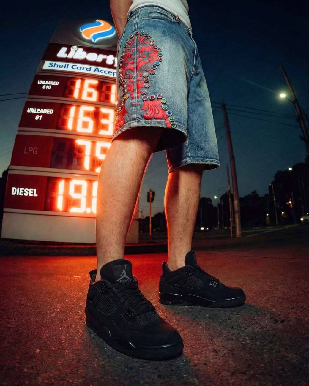 PREME denim at a gas station at night