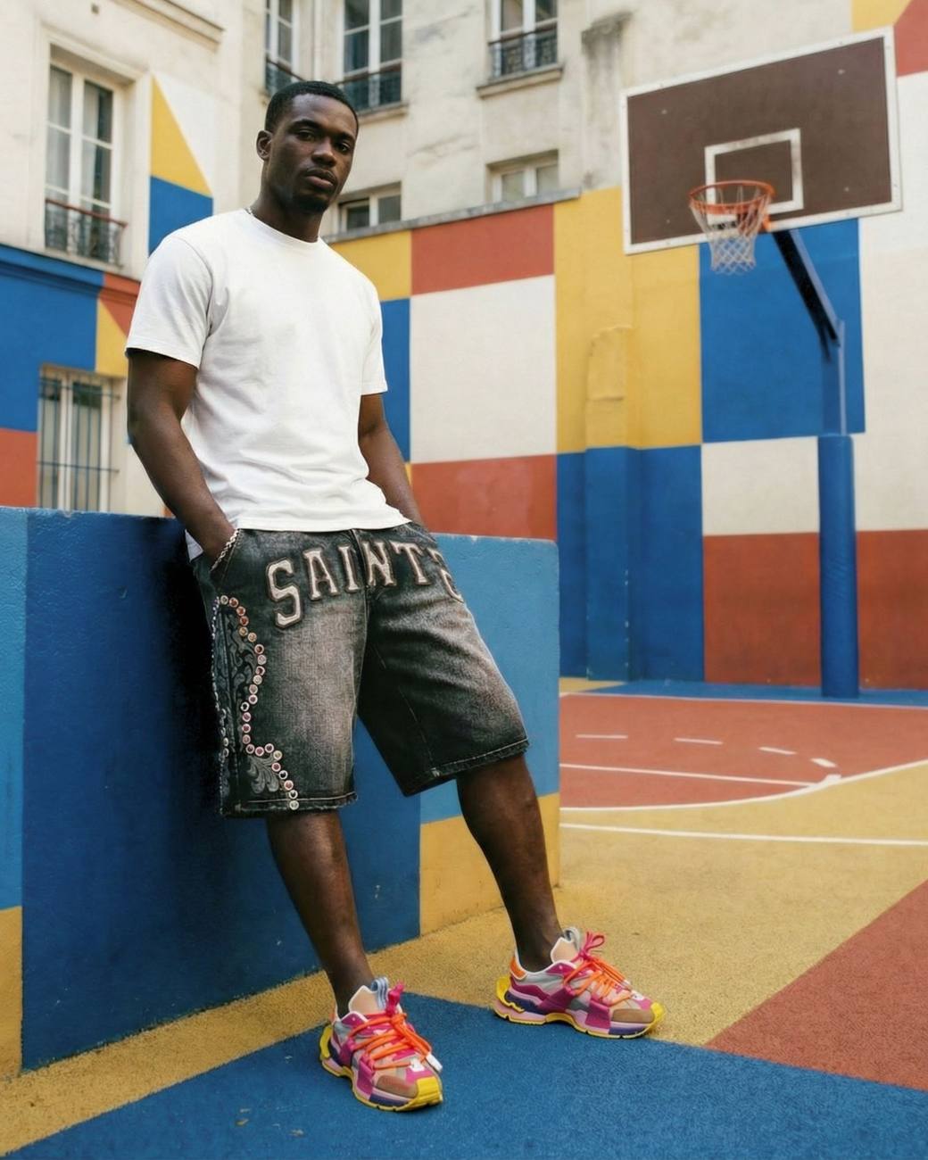 Model in PREME on a painted basketball court